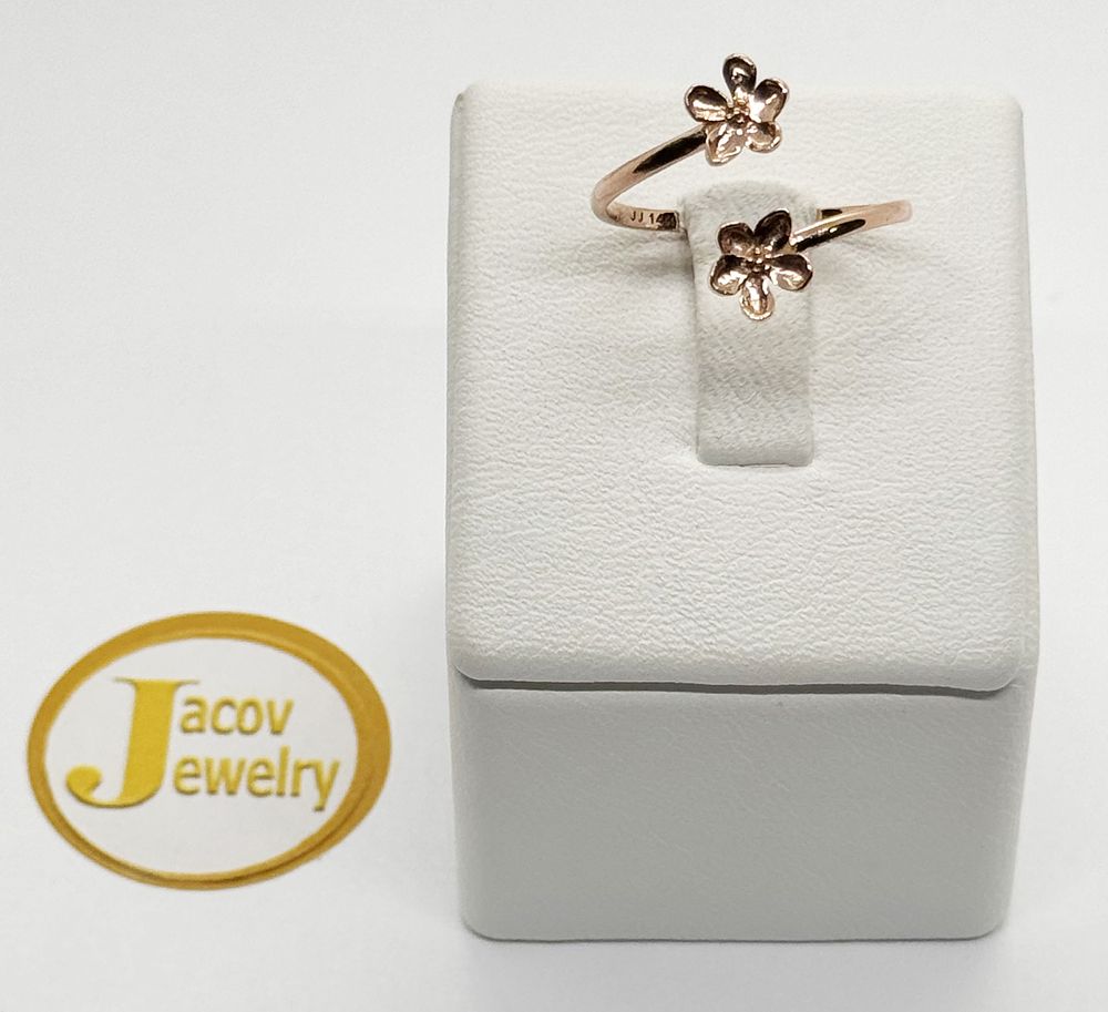 Flexible open ring flower model rose gold red 14K new.... Gold metal 
Purity: 14K 
Color: Red 