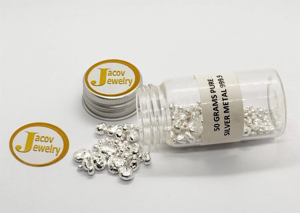 A bottle containing 50 grams of 999 pure silver granules.... The item has been inspected and 