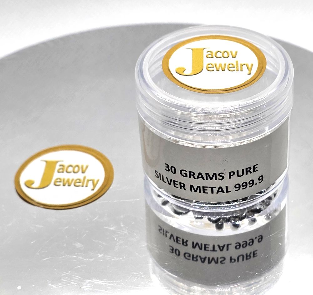A bottle containing 30 grams of 999 pure silver granules. The item has been inspected and 