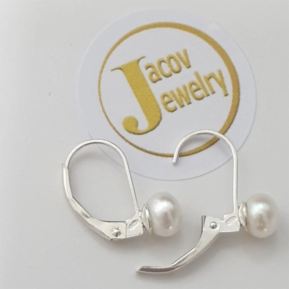 A pair of hoop earrings set with natural pearls in 925 silver, new.... Silver Metal 
Purity: 