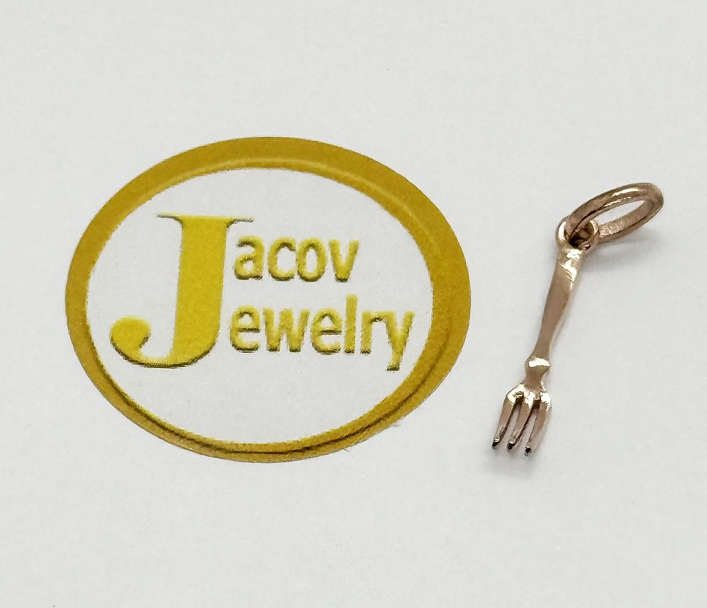Fork model pendant in red rose gold 14K new.... Gold metal 
Purity: 14K 
Color: Red (Rose Gold) 
