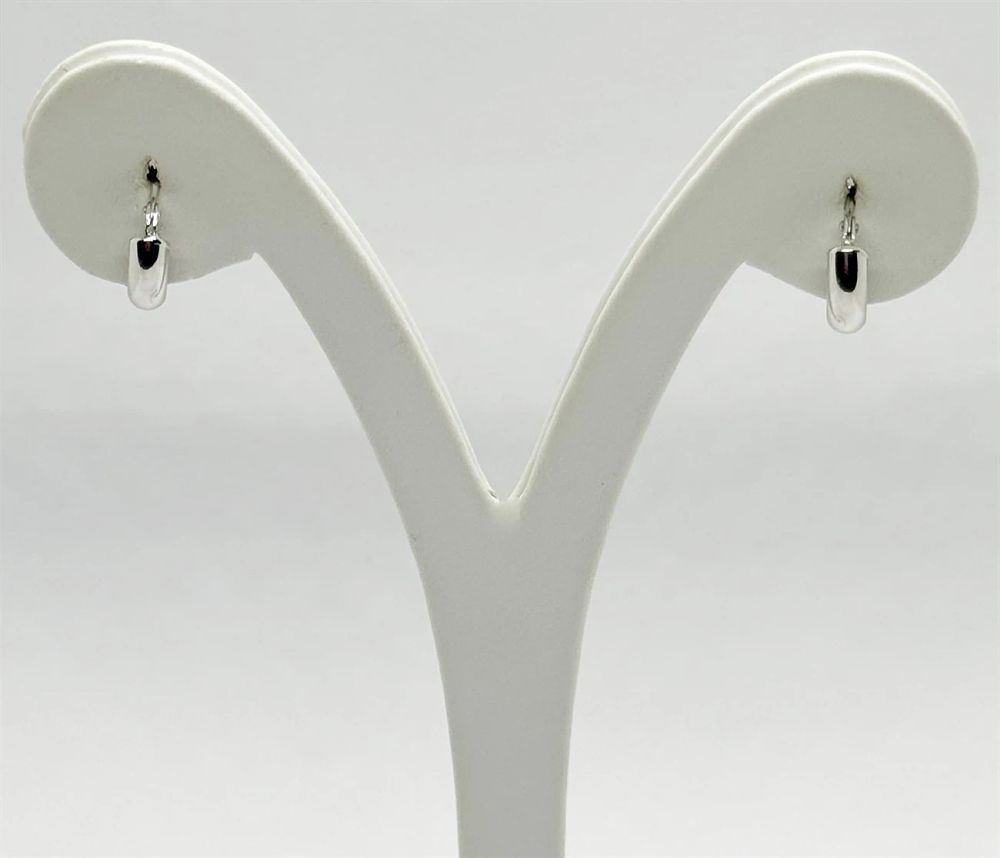 A pair of hoop earrings in a smooth round design, diameter 12 mm New in 14K white gold.... A 