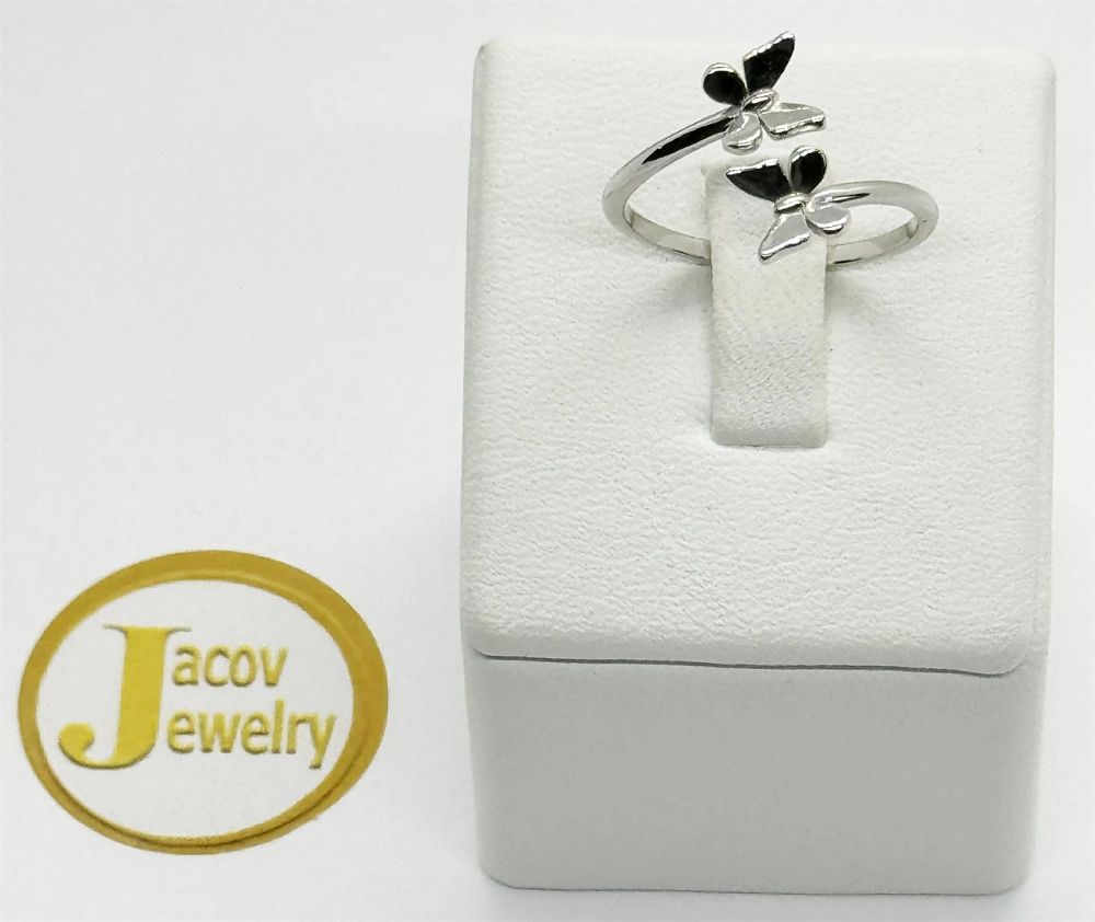 A flexible open ring with a butterfly model in a special design 
New 14K white gold.... Gold 