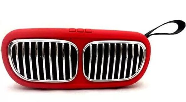 Mini portable speaker grill model of a new car in packaging...red color. Powerful portable 