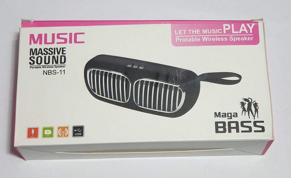 Mini portable speaker grill model of a new car in packaging...red color. Powerful portable 