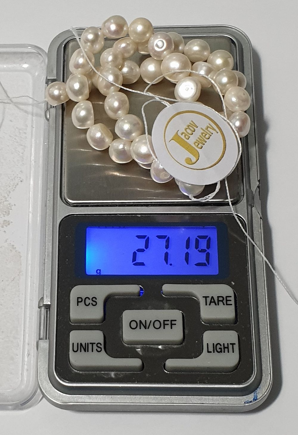 Natural pearl sleeve in a new white shade.... 
Freshwater farming (ready to work with 2 holes) 