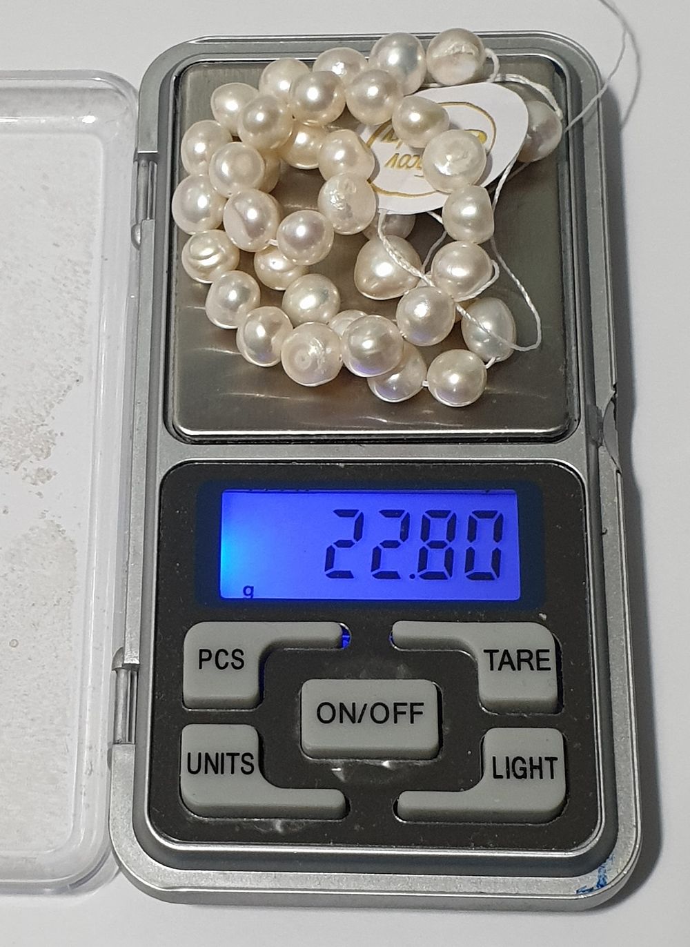 Natural pearl sleeve in a new white shade.... 
Freshwater farming (ready to work with 2 holes) 