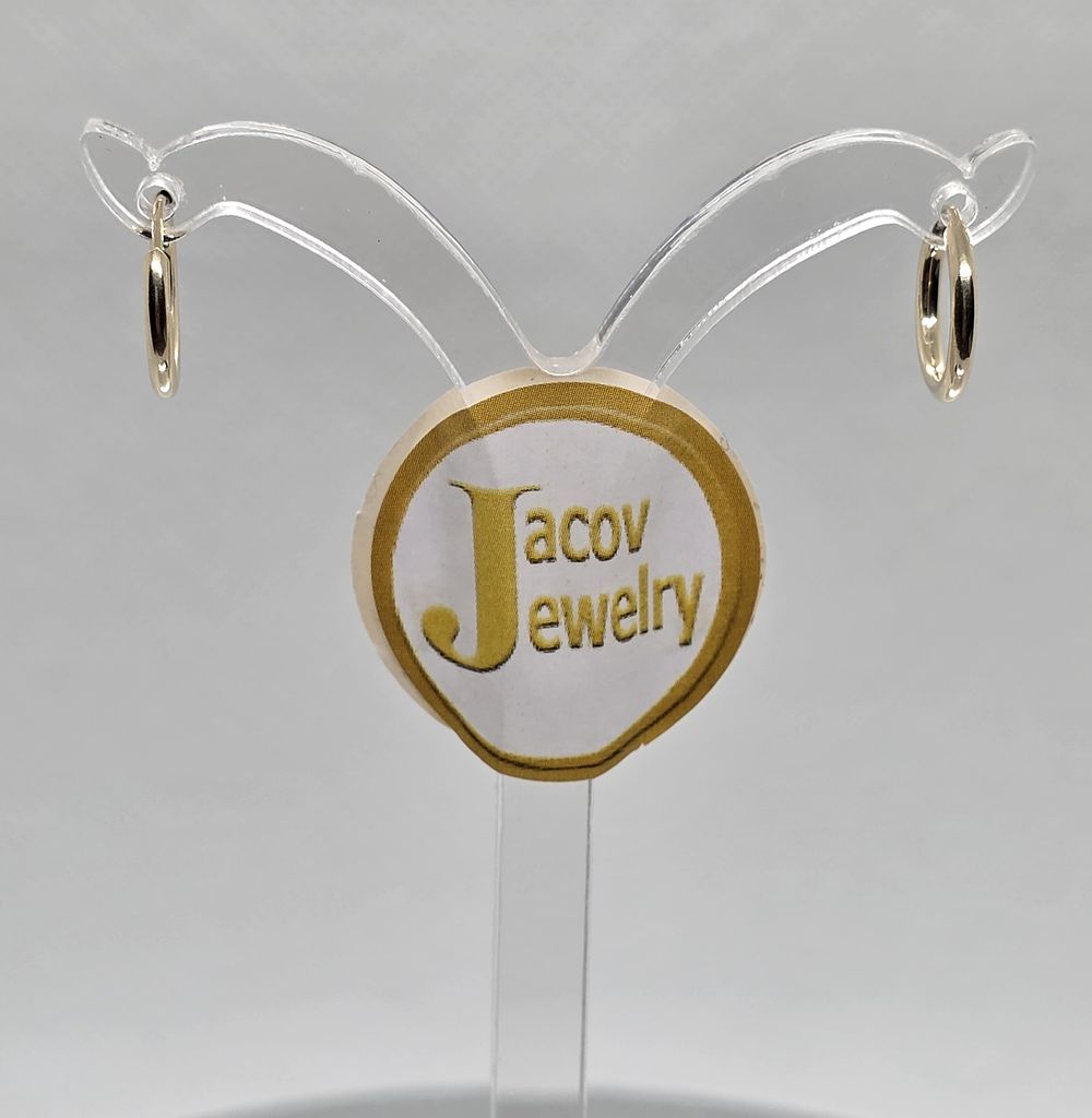 A pair of flexible hollow hoop earrings, diameter 12 mm, 
in 14K yellow gold, new.... Pair of 