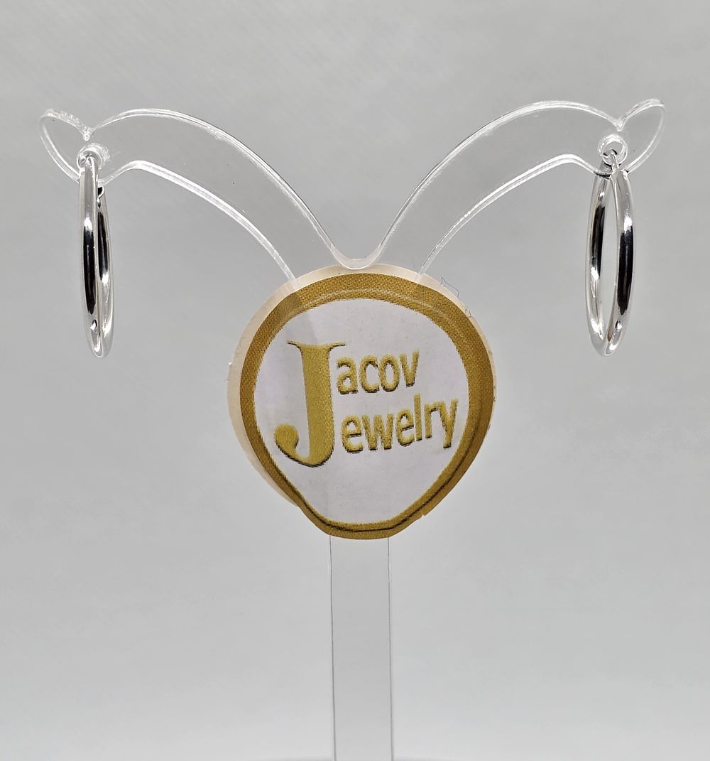 A pair of flexible hollow hoop earrings, diameter 18 mm, 
in 14K white gold, new.... Pair of 