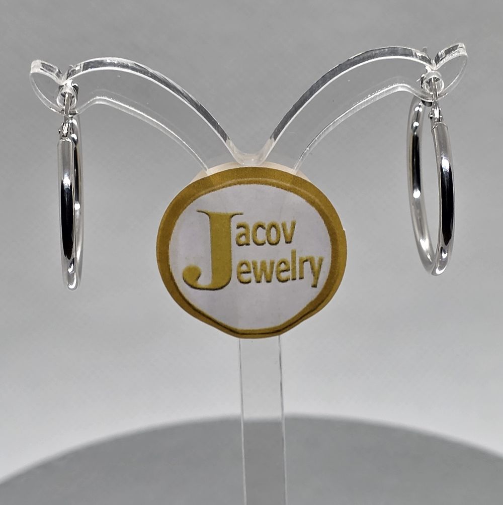 A pair of new 14K white gold hoop earrings, 
diameter 25 mm.... Pair of 14K White Gold Hoop 