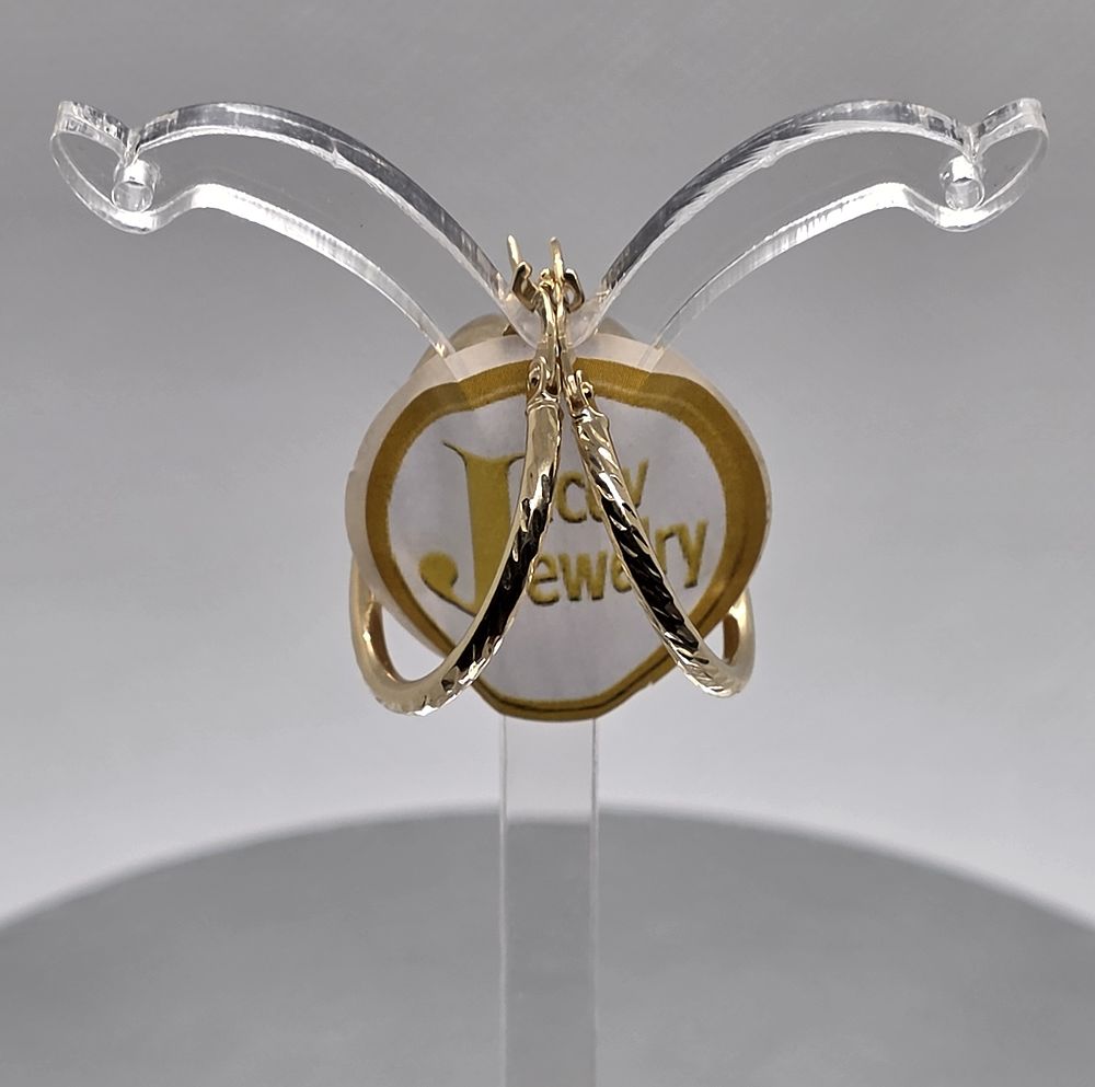 A pair of diamond-cut hoop earrings, diameter 25 mm, 
in 14K yellow gold, new.... Pair of 14K 