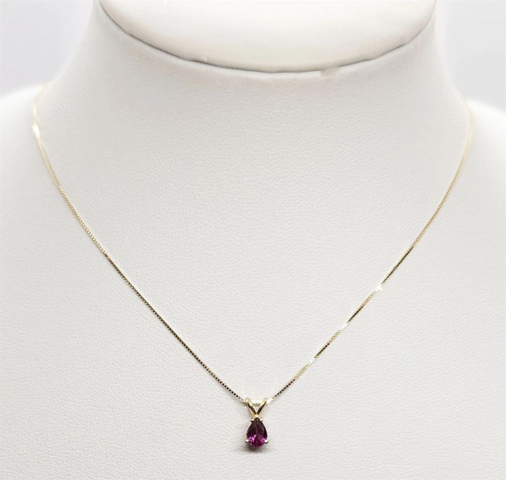 New 14K yellow gold rhodolite garnet stone drop necklace and pendant.... Gold metal 
Purity: 
