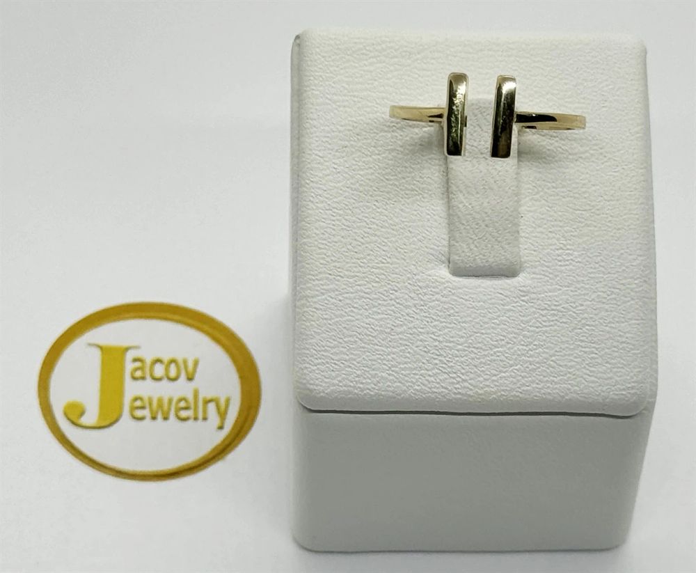 14K yellow gold open striped ring.... Gold Metal 
Purity: 14K 
Color: Yellow 
Jewelry Weight: 