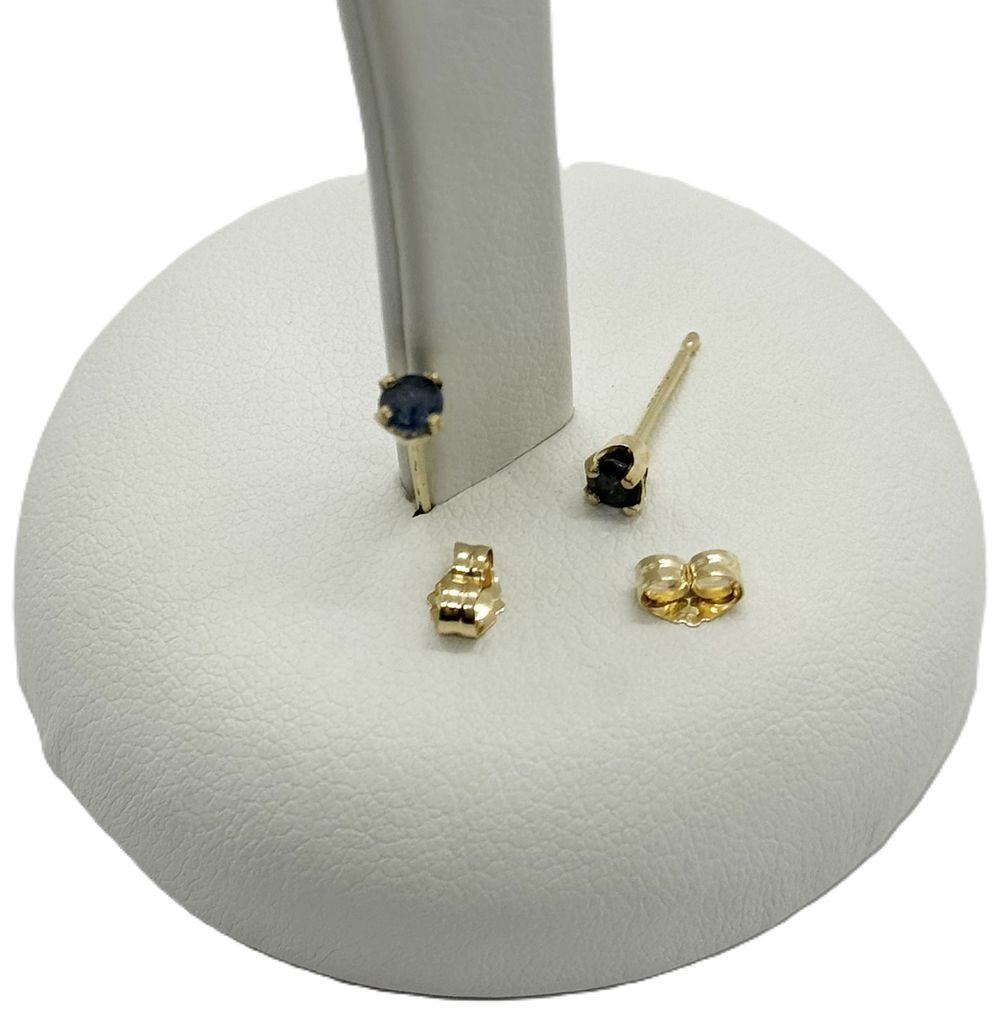 A pair of dark blue sapphire natural stone earrings 
New in 14K yellow gold.... Gold metal 