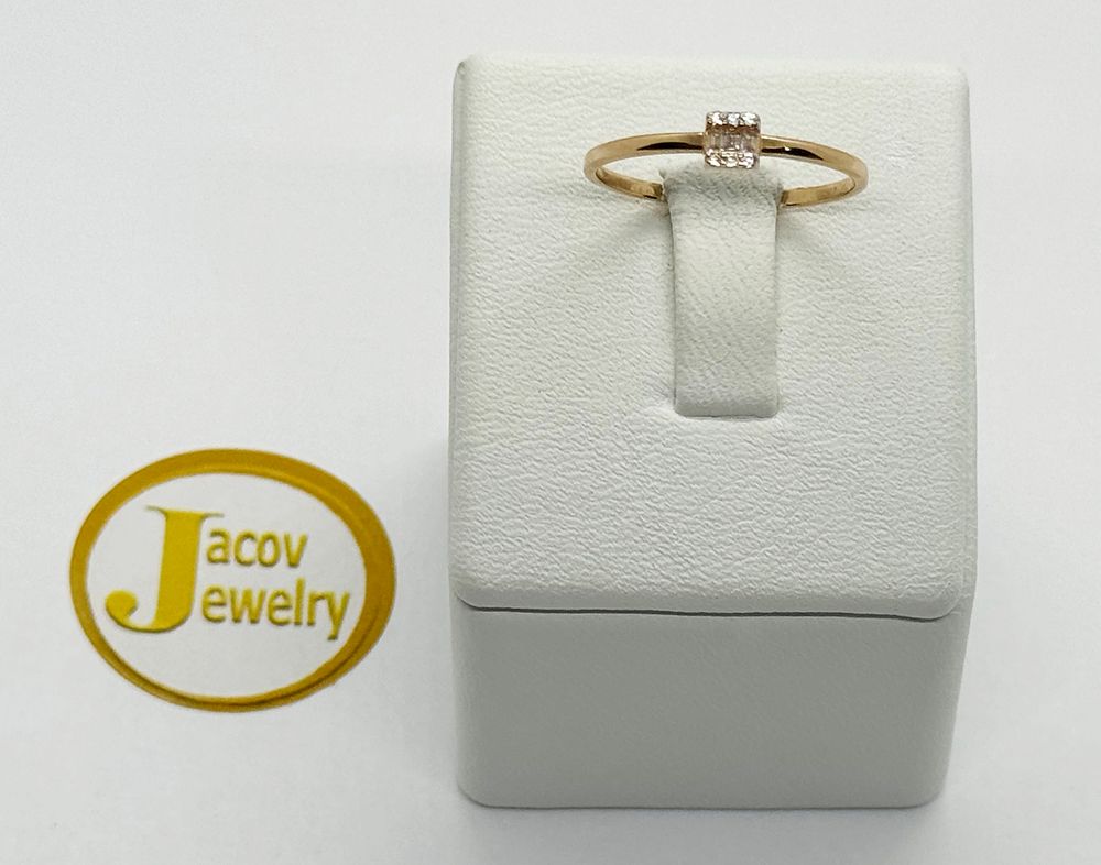 Baguette and solitaire model ring studded with zircon stones 
Red gold rose gold 14K new.... Gol 