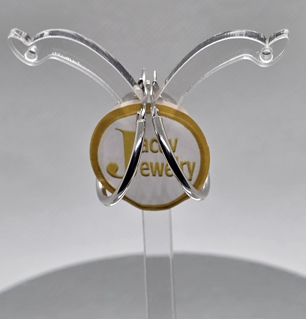 A pair of new 14K white gold hoop earrings, 
diameter 25 mm.... Pair of 14K White Gold Hoop 