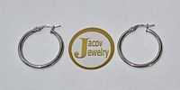 A pair of new 14K white gold hoop earrings, 
diameter 25 mm.... Pair of 14K White Gold Hoop Image - 2