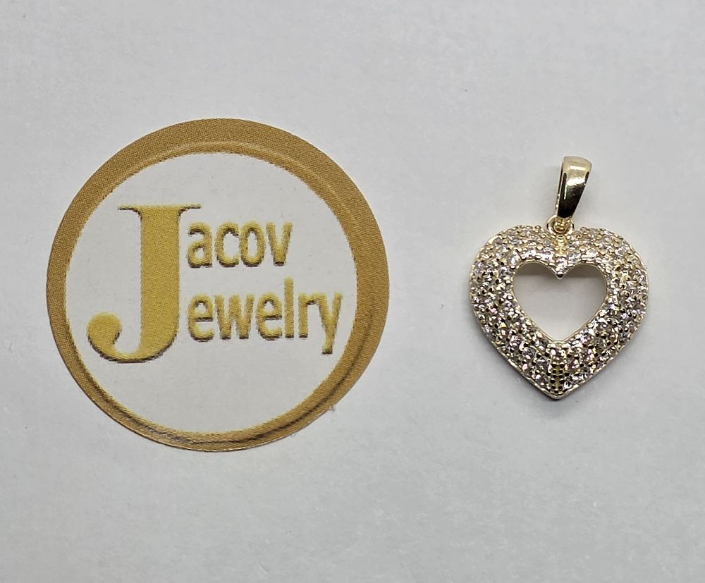 Heart-in-a-heart pendant set with zircon stones 
in 14K yellow gold new....
*Suitable as a 
