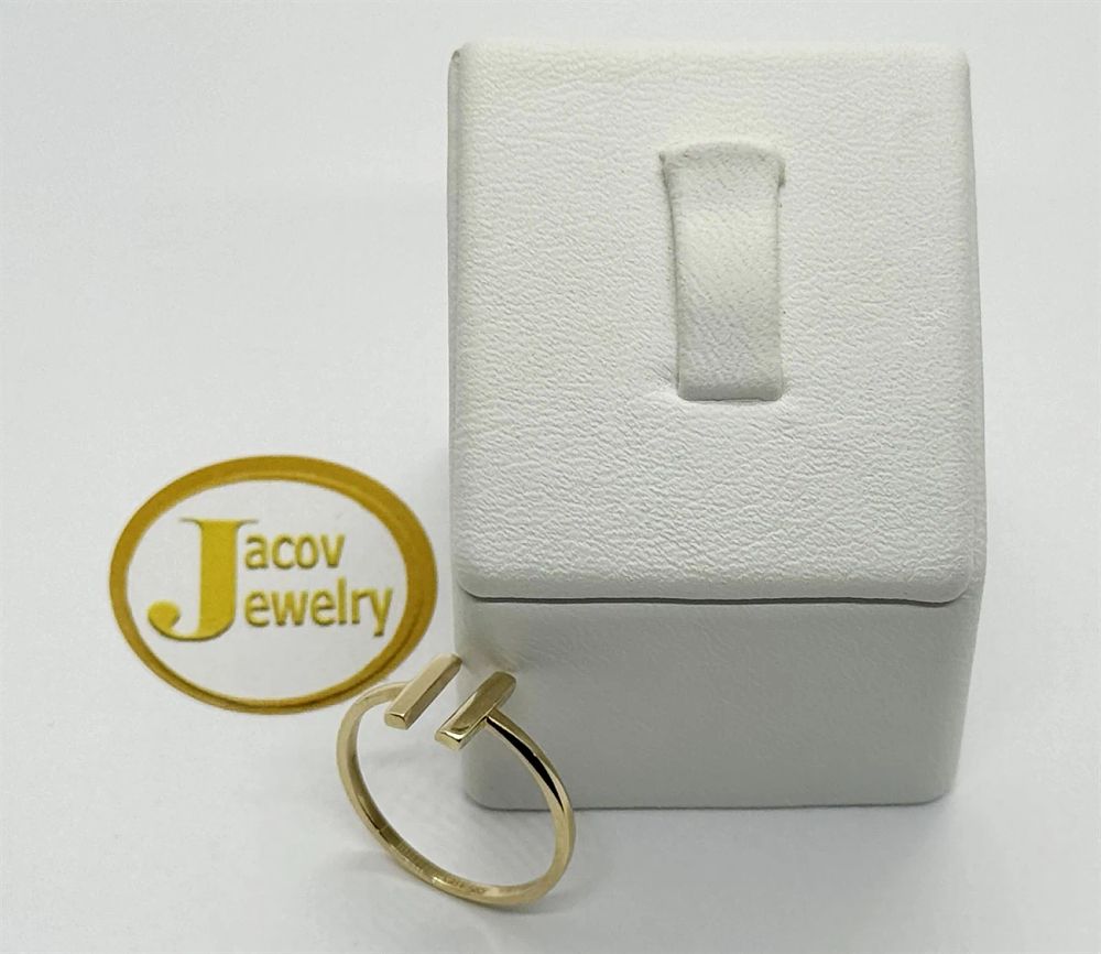 14K yellow gold open striped ring.... Gold Metal 
Purity: 14K 
Color: Yellow 
Jewelry Weight: 