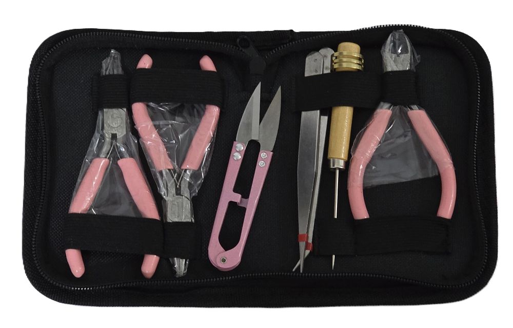 A new pink jeweler's tool kit.... Jeweler's Tool Set in a Bag 
Tool Details: 
1. Toothed Nose 