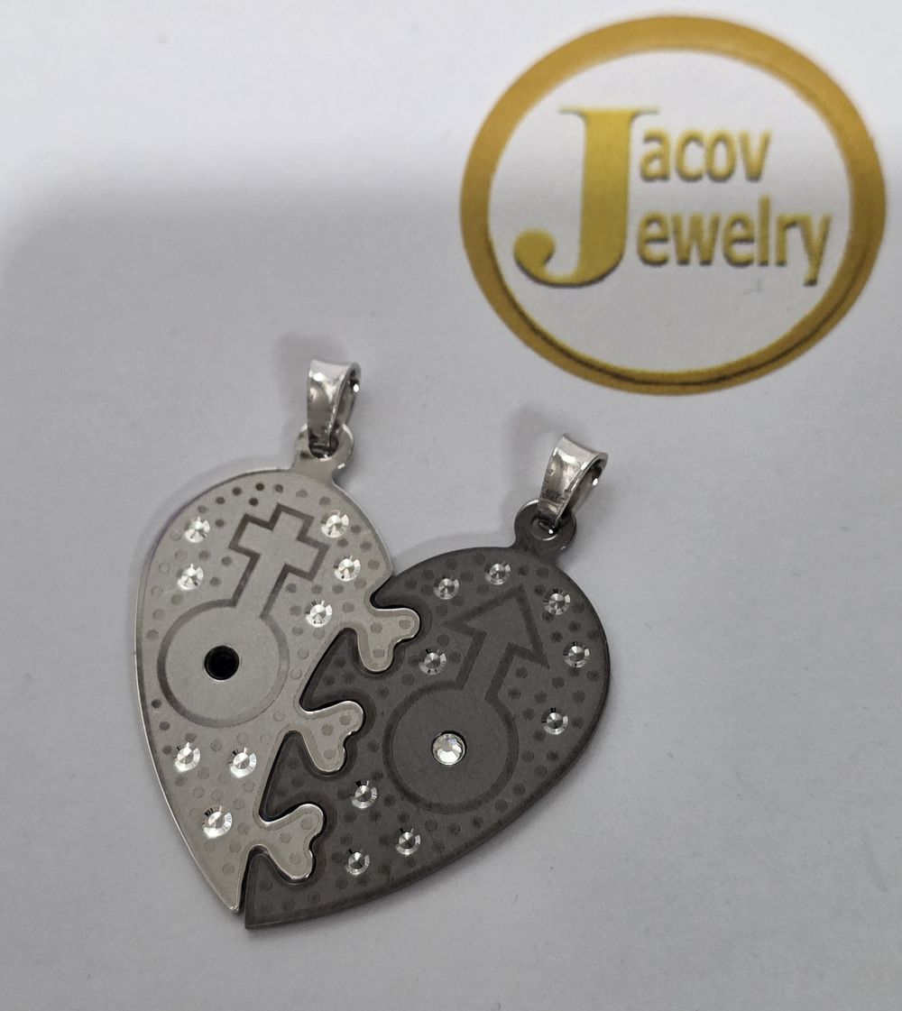 Male Female Heart Pendant Encrusted with Zircon Stones 925 Silver New.... 
The friendship 