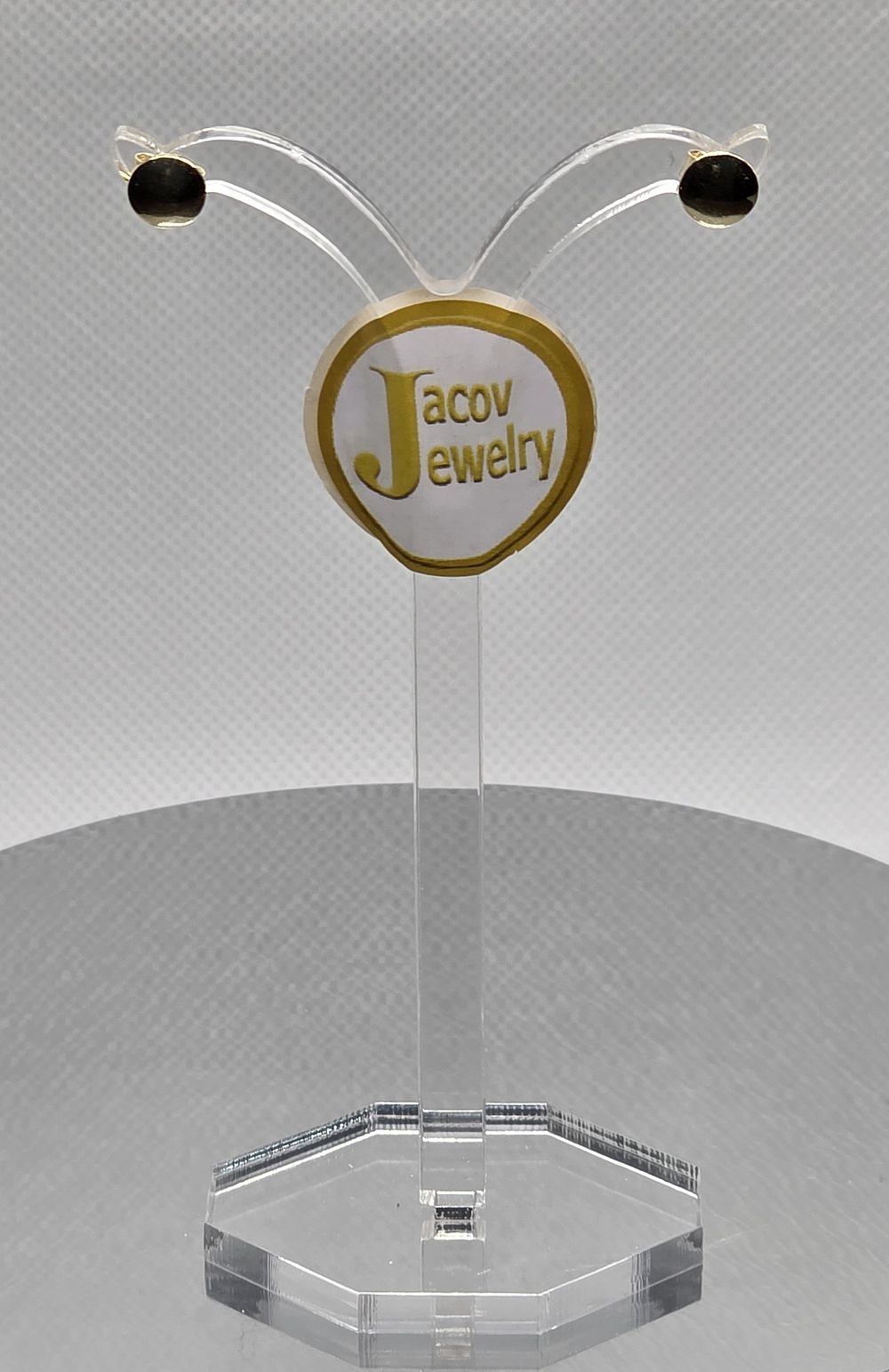 A pair of new 14K yellow gold round end earrings.... Pair of round end earrings 
Gold metal 
