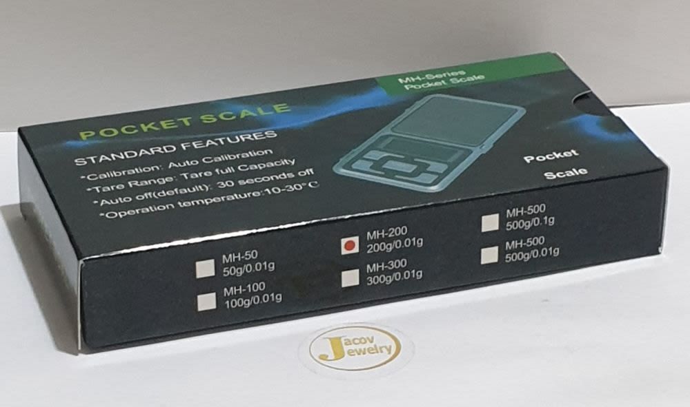 New electronic scale for jewelry, comes in its packaging and includes 2 batteries; pocket-sized 