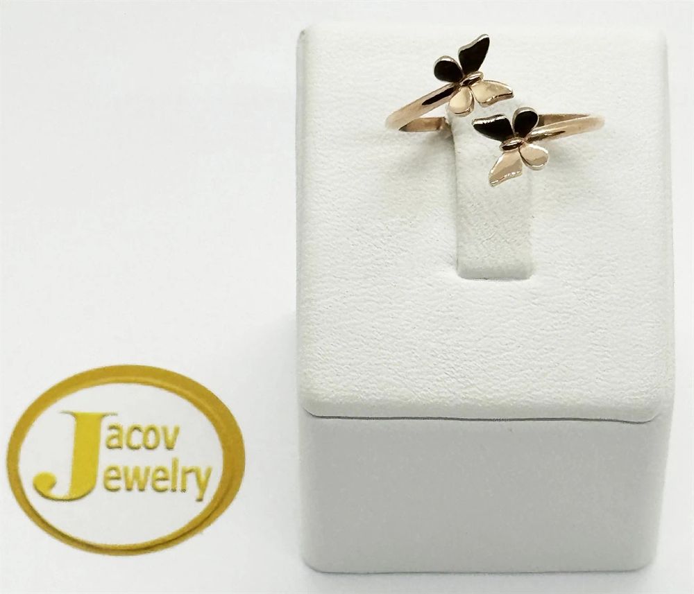 A flexible open ring with a butterfly model in a special design 
In red gold (rose gold) new 14K.
