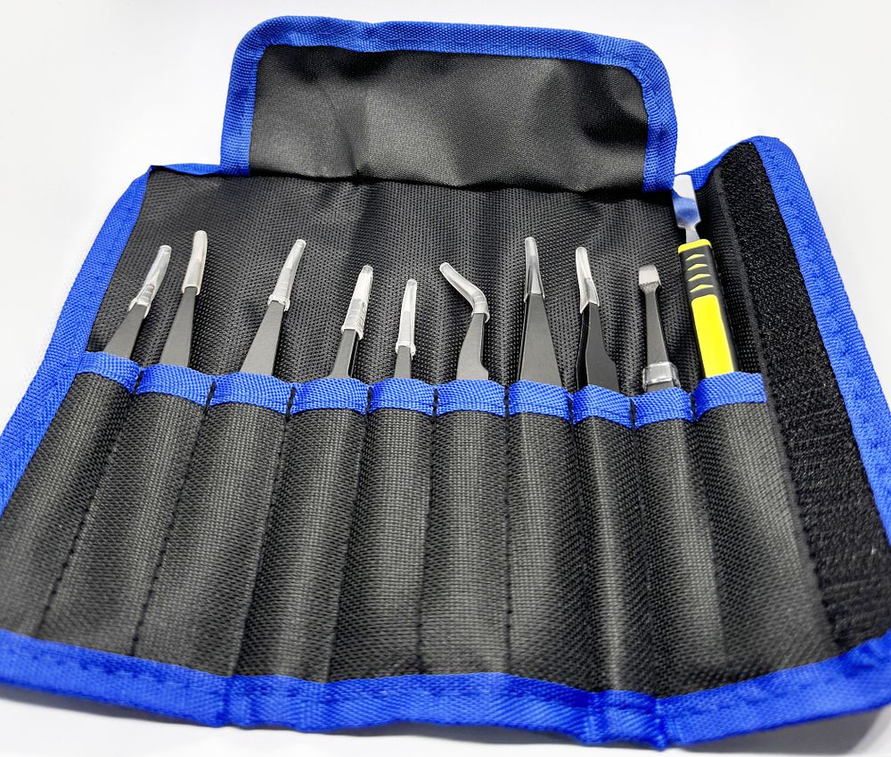 A new set of tweezers.... *High-quality stainless steel tweezers set, comes with a case. 
The 