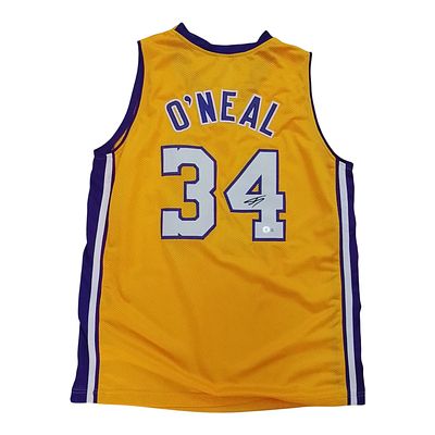 שאקיל אוניל (Shaquille O’Neal) – גופיית לוס אנג’לס לייקרס מקורית, מספר 34, חתומה ביד השחקן. מצב 