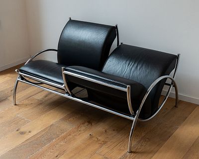 ספת Cor Tam דו מושבית של המעצב Peter Maly\Tomas Pecher עבור חברת Corהגרמנית, מ 1988-1991. 
COR 