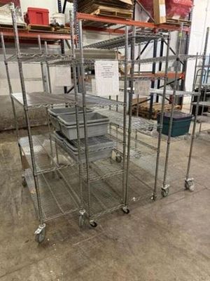 4 Metal Shelves With Bus Bins. Located In Lubbock, Tx