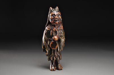 Netsuke / Нэцкэ Они но нэмбуцу. Япония, Осака, XVIII век, Эдо период. 
Дерево; резьба 