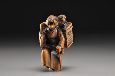 Netsuke/ Нэцкэ Слепец с тенгу. Япония, начало XIX века, Эдо период 
Дерево, резьба 
Высота: 46 
