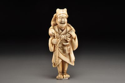 Netsuke / Нэцкэ Сарумаваси с обезьянкой. Япония, Камигата, период Эдо, конец XVIII - начало XIX 