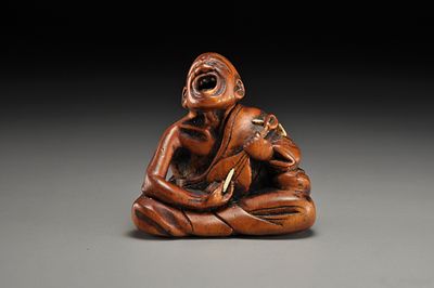 Netsuke / Нэцкэ Музыкант с бивой. Япония, Токио, период Мейдзи, вторая половина XIX века 
