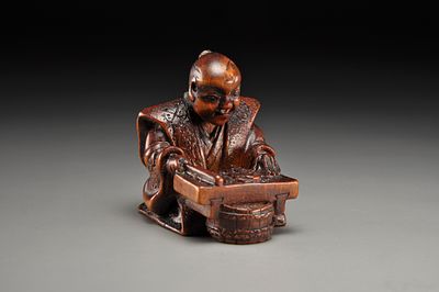Netsuke / Нэцкэ Японец за приготовлением еды. Япония, период Мейдзи, вторая половина XIX века. 
