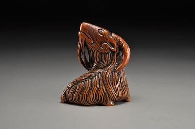 Netsuke/ Нэцкэ Козел. Япония, XIX век, период Мэйдзи (1868–1912) 
Дерево; резьба 
Высота: 46 мм 