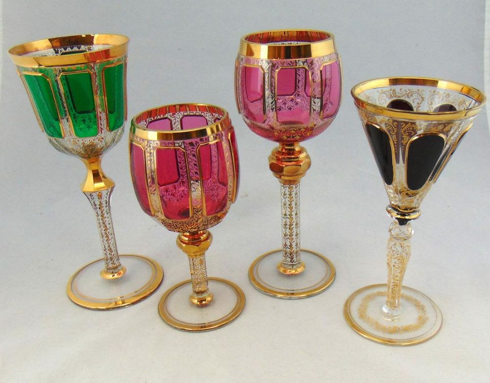 Lot 236: Four Listovane glass goblets