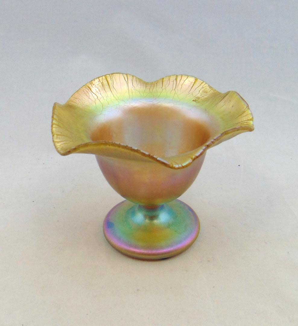 Lot 377: Quezal flower form glass vase