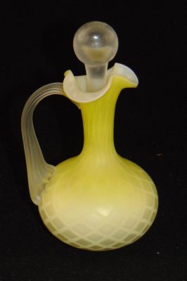 Yellow MOP glass cruet. Yellow diamond quilted MOP glass cruet with a camphor reeded handle, 7"