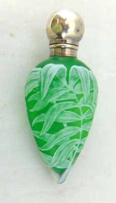 Webb English cameo perfume. Webb tear drop perfume bottle in frosted green glass decorated with