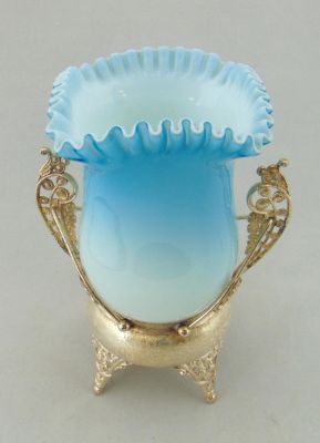 Blue Satin glass celery vase. Blue satin glass celery vase with a crimped ruffle rim set in a