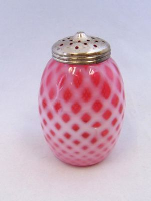 Buckeye Bubble Lattice sugar shaker. Ovoid Buckeye cranberry opalescent sugar shaker in the