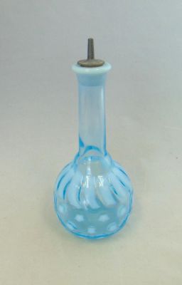 Blue opalescent Barber bottle. Bulbous opalescent Barber bottle in the Stars and Stripes pattern