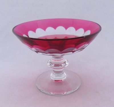 Val St. Lambert cut glass compote. Ruby cut to clear compote, signed Val St. Lambert, 6" wide.