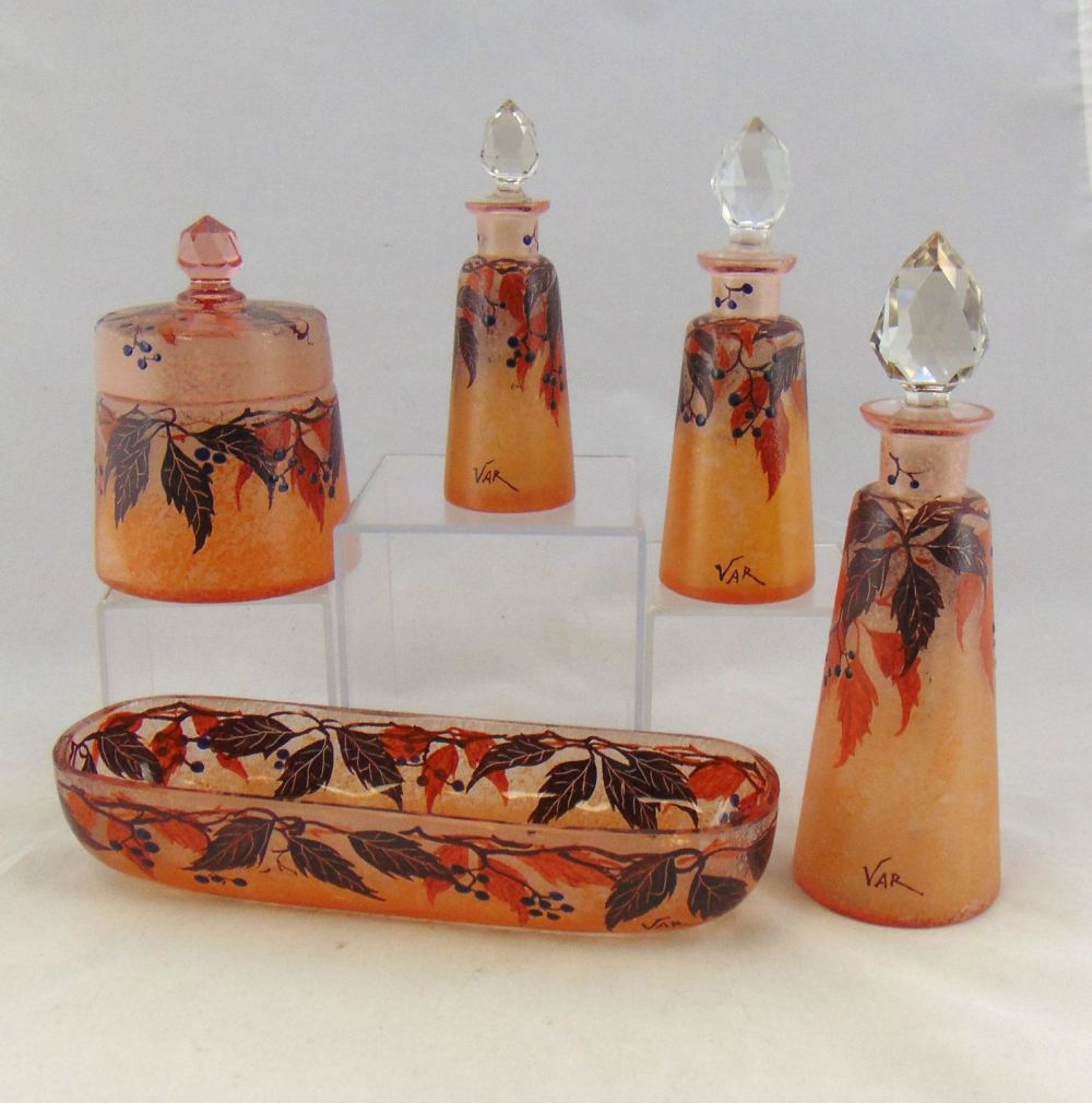 Lot 219: Five piece Enameled dresser set