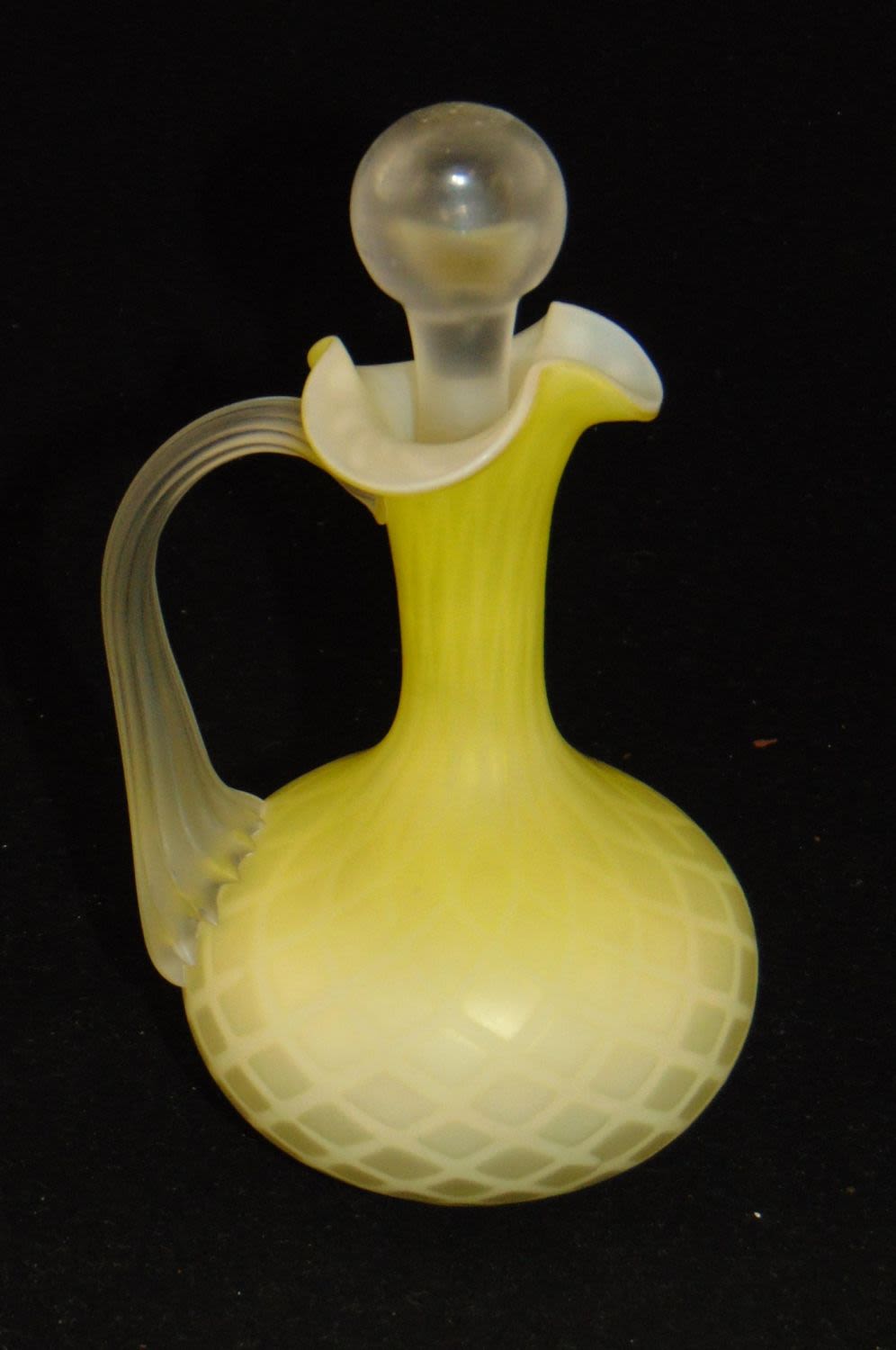 Lot 215: Yellow MOP glass cruet