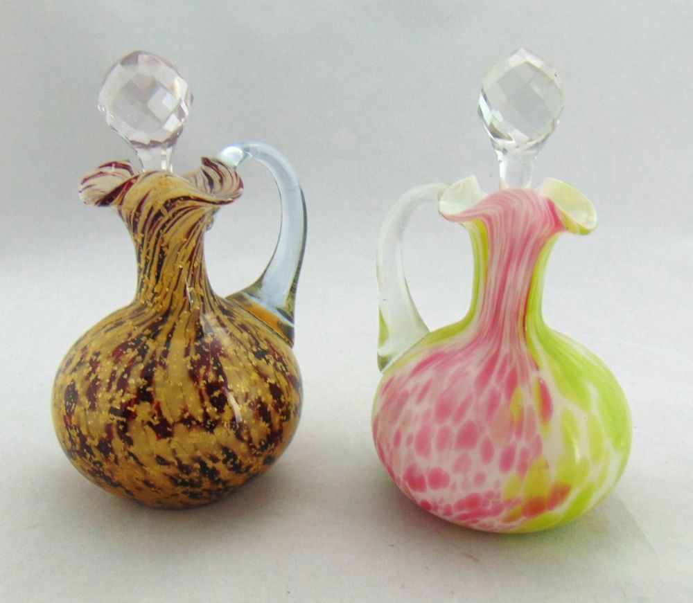 Lot 217: Two spatter ware cruets