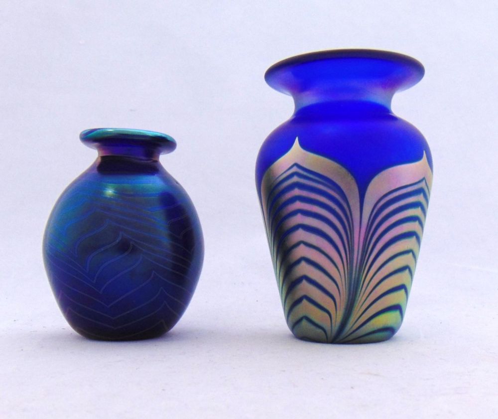 Lot 370: Two iridescent blue glass vases